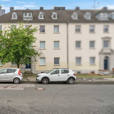 Denkmalgeschütztes Mehrfamilienhaus mit zeitloser Eleganz