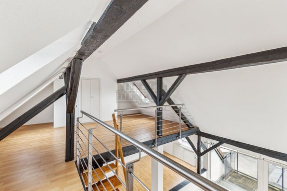 Attraktive Balkonwohnung mit Empore in gefragter Wohnlage